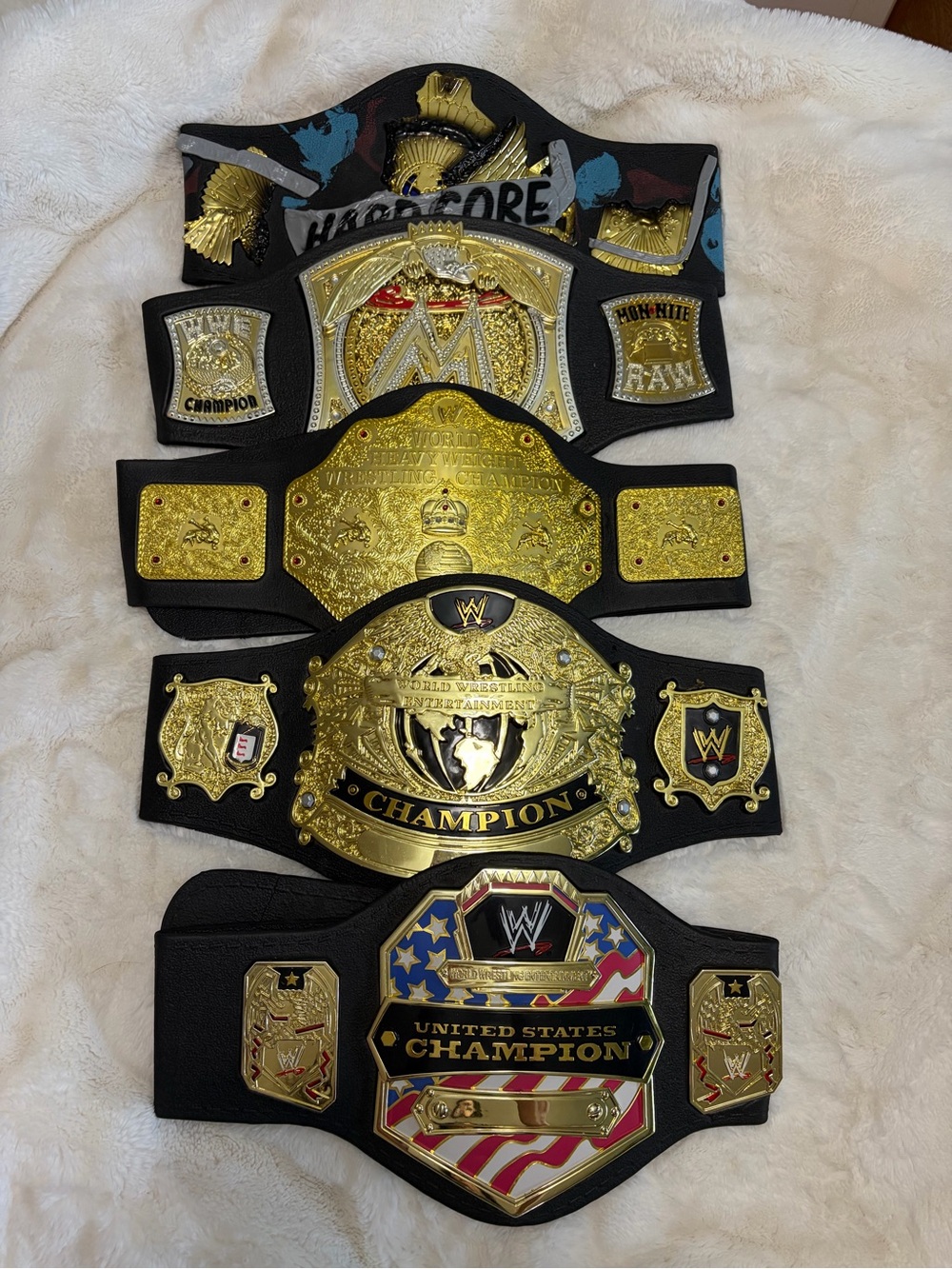 Gold & Black Championship Belt Collection with Red, Blue, White Accents